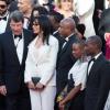 La ministre Yamina Benguigui, tout de blanc vêtue, entourée de réalisateurs francophones lors de la Montée des marches du film Le Passé. 66e Festival du film de Cannes, le 17 mai 2013