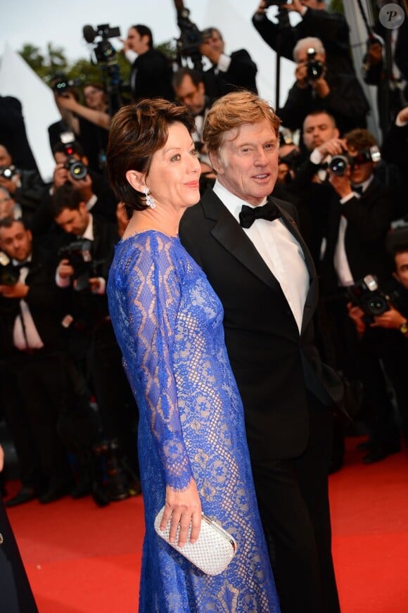 Robert Redford et Sibylle Szaggars à la montée des marches du film All Is Lost au Palais des Festivals, Cannes, le 22 mai 2013.