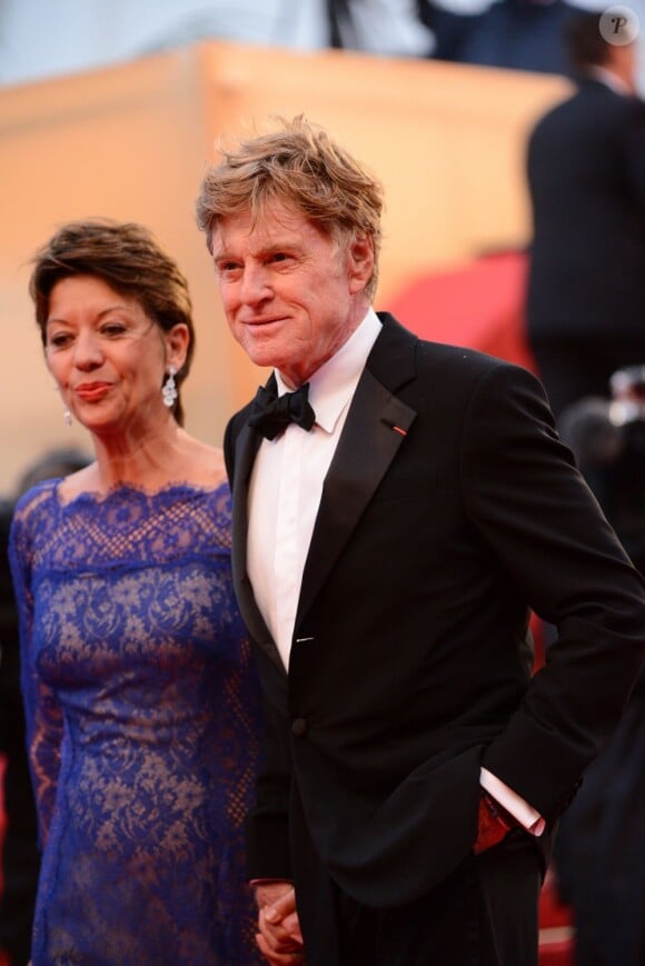 Robert Redford et Sibylle Szaggars lors de la montée des marches du film All Is Lost au Palais des Festivals, Cannes, le 22 mai 2013.