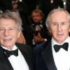 Roman Polanski et Jackie Stewart lors de la montée des marches du film All Is Lost au Palais des Festivals, Cannes, le 22 mai 2013.