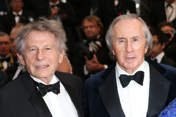 Roman Polanski et Jackie Stewart lors de la montée des marches du film All Is Lost au Palais des Festivals, Cannes, le 22 mai 2013.