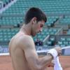 Novak Djokovic lors d'un entraînement sur la terre rouge de Roland-Garros, le 23 mai 2013