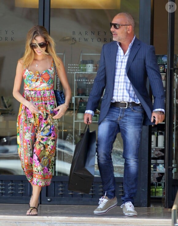 Christian Audigier et sa douce Nathalie Sorensen font une virée shopping à Beverly Hills, le 22 mai 2013.