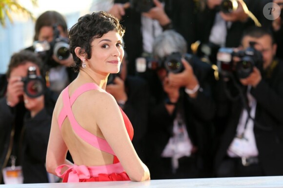 Audrey Tautou, maîtresse de ceremonie, pose au photocall de la remise des palmes lors du 66e Festival de Cannes, le 26 mai 2013.