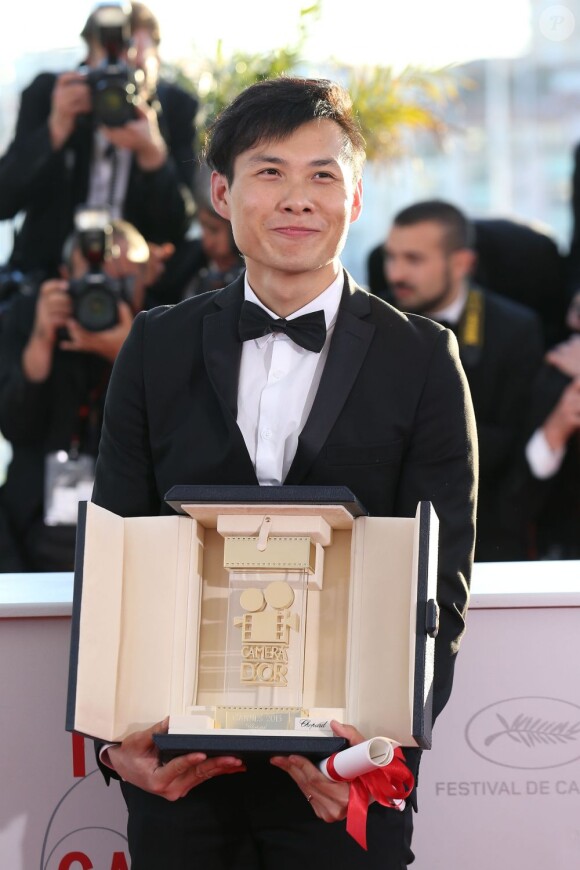 Anthony Chen (Caméra d'Or pour "Ilo Ilo") au photocall de la remise des palmes lors du 66e Festival de Cannes, le 26 mai 2013.