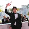Moon Byung-gon (Prix du court-métrage pour "Safe") au photocall de la remise des palmes lors du 66e Festival de Cannes, le 26 mai 2013.
