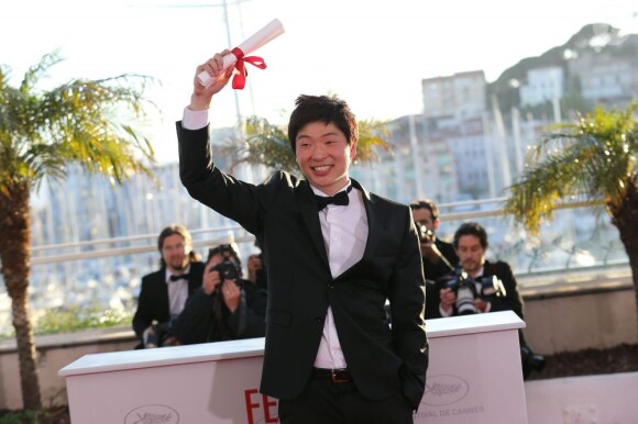 Moon Byung-gon (Prix du court-métrage pour "Safe") au photocall de la remise des palmes lors du 66e Festival de Cannes, le 26 mai 2013.