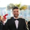 Oscar Isaac (Grand Prix du jury pour "Inside Llewyn Davis" de Ethan et Joel Coen)  au photocall de la remise des palmes lors du 66e Festival de Cannes, le 26 mai 2013.