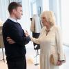Camilla Parker Bowles, en grande discussion avec Raf Simmons, a eu le privilège de visiter un atelier de la maison Dior, le 28 mai 2013, lors de sa visite officielle à Paris.