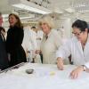 Camilla Parker Bowles a eu le privilège de visiter un atelier de la maison Dior, le 28 mai 2013, lors de sa visite officielle à Paris.