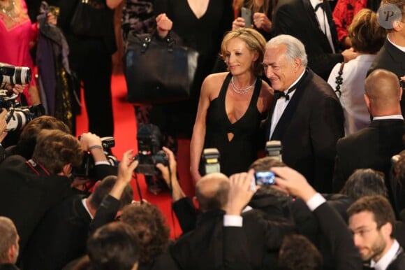 Dominique Strauss-Kahn et sa compagne Myriam L'Aouffir sur le tapis rouge lors du 66e Festival de Cannes, le 25 mai 2013.