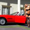 Nikki Leigh pose avec une Maserati Ghibli Spyder SS de 1970, à Brentwood, le 31 mai 2013. L'ex-playmate s'apprête justement à faire ses débuts au cinéma dans un film sur des pilotes de courses automobiles, Snake and Mongoose.