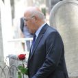 Michel Sapin lors de l'enterrement du constitutionnaliste Guy Carcassonne au cimetière de Montmartre le 3 juin 2013