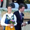 La princesse Madeleine de Suède et son fiancé Chris O'Neill se sont montrés très amoureux lors des célébrations de la Fête nationale à Stockholm, le 6 juin 2013, auxquelles prenaient part le couple royal, la princesse Victoria et le prince Daniel avec la princesse Estelle, et le prince Carl Philip.