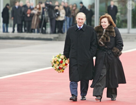 Vladimir Poutine et sa femme Lioudmila rencontrant en 2006 George W. Bush