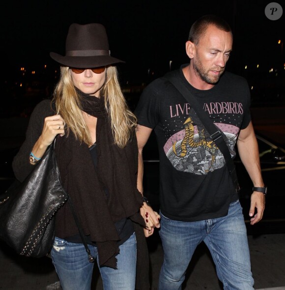 Heidi Klum avec son petit ami Martin Kirsten à l'aéroport de Los Angeles, le 7 juin 2013.