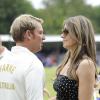 Elizabeth Hurley à un match caritatif de cricket, Cricket For Kids Charity Day, à Cirencester, le 9 juin 2013. La jolie brune était accompagnée de son chéri l'Australien Shane Warne, ancien joueur professionnel de cricket.