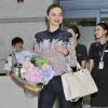 Le top Miranda Kerr arrive à Séoul le 11 juin 2013 et a le droit à un comité d'accueil !