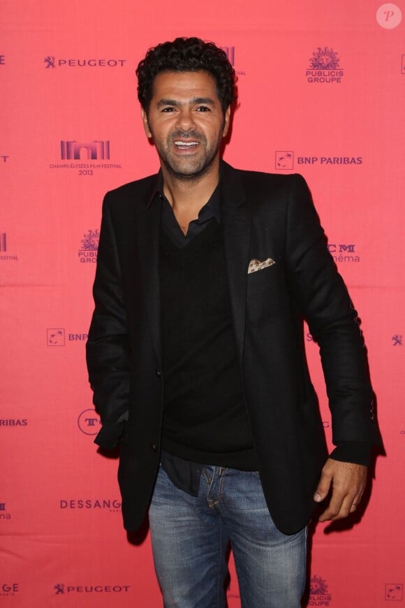 Le comédien et humoriste Jamel Debbouze au photocall du film Né Quelque part, lors du Champs-Elysées Film Festival au Cinéma Publicis à Paris. Le 15 juin 2013.