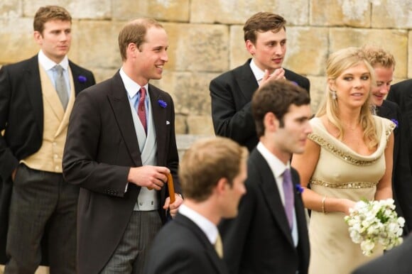 Le prince William et Chelsy Davy, demoiselle d'honneur et ex du prince Harry lors du mariage de Lady Melissa Percy, fille du duc de Northumberland, et de Thomas van Straubenzee à Alnwick en Angleterre le 22 juin 2013