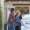 Billy Ray Cyrus et sa future ex-femme Tish se montrent particulièrement proches lors d'une sortie au restaurant avec leur fille Noah, à North Hollywood, le 23 juin 2013.