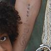 Heidi Klum, son petit ami Martin Kirsten et les enfants du top, Leni, Henry, Johan à New York, le 24 juin 2013. Elle pourra bientôt dire adieu à son tatouage.