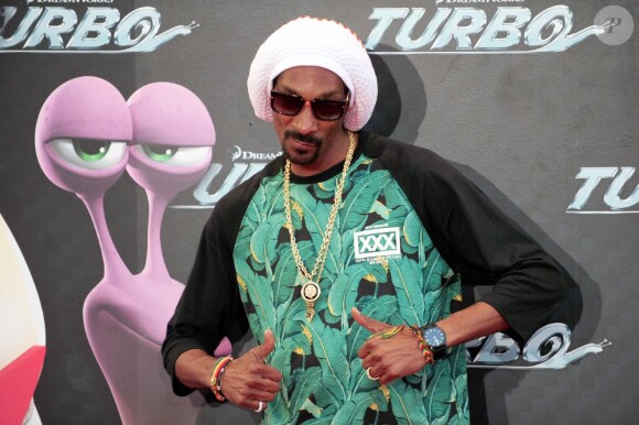 Snoop Lion (Snoop Dogg) pose lors de la première mondiale de Turbo à Barcelone, le 25 juin 2013.