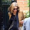 Exclusif - Kate Moss, ultra chic à la sortie de son domicile, porte une petite veste à franges Saint Laurent, un sac Balenciaga et des bottines Azzedine Alaïa. Le 26 juin 2013.