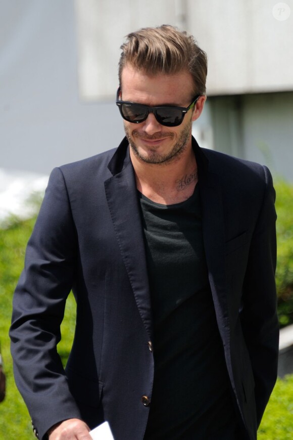 David Beckham arrive au parc André Citroën pour assister au défilé Louis Vuitton printemps-été 2014. Paris, le 27 juin 2013.