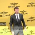 David Beckham et John Travolta lors de l'inauguration de la nouvelle boutique Breitling à Londres. Le 27 juin 2013.