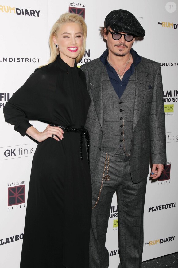 Amber Heard et Johnny Depp à New York le 25 octobre 2011 pour la présentation de Rhum Express