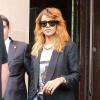 Rihanna quitte l'hôtel Royal Monceau à Paris. Le 2 juillet 2013.