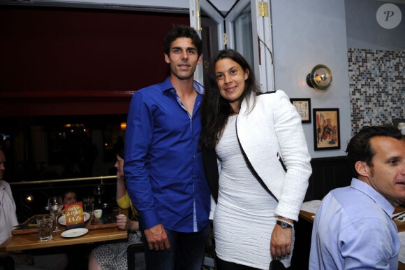 Marion Bartoli et Thomas Drouet, son partenaire d'entraînement, dînent au restaurant Café Rouge. Londres, le 6 juillet 2013.