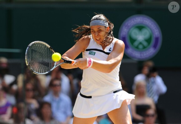 Marion Bartoli lors de sa finale de Wimbledon face à l'Allemande Sabine Lisicki. Londres, le 6 juillet 2013.