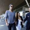 Eva Longoria et son compagnon Ernesto Arguello quittent l'hôtel George V et se rendent à l'aéroport Charles de Gaulle à Paris le 9 juillet 2013. Eva et Ernesto ont passé le week-end en amoureux dans la capitale avant qu'Eva Longoria pose lors d'un shooting pour l'Oréal dans un château.