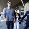 Eva Longoria et son compagnon Ernesto Arguello quittent l'hôtel George V et se rendent à l'aéroport Charles de Gaulle à Paris le 9 juillet 2013. Eva et Ernesto ont passé le week-end en amoureux dans la capitale avant qu'Eva Longoria pose lors d'un shooting pour l'Oréal dans un château.