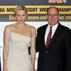 Le prince Albert de Monaco et la princesse Charlene au Sporting d'été de Monte-Carlo le 13 juillet 2013 pour la finale du Million Dollar Super 4.