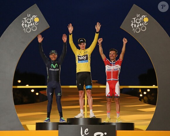Chris Froome, vainqueur du Tour de France 2013 devant Nairo Quintana et Joaquim Rodriguez sur le podium de la Grande Boucle à Paris le 21 juillet 2013
