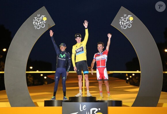 Chris Froome, vainqueur du Tour de France 2013 devant Nairo Quintana et Joaquim Rodriguez sur le podium de la Grande Boucle à Paris le 21 juillet 2013