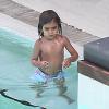 Mason, 3 ans, en vacances avec ses parents et sa petite soeur Penelope à Miami, le 21 juillet 2013.