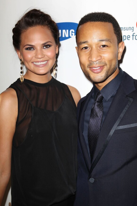 John Legend et sa fiancée Chrissy Teigen à New York le 11 juin 2013.
