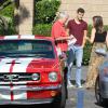 Amatrice de belles voitures, l'actrice Sophia Bush s'est offert une Mustang GT 350 rouge flamboyante, livrée à son domicile, le 24 juillet 2013.