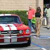 Sophia Bush a recu une commande très spéciale à son domicile : sa Mustang GT 350 rouge à bandes blanches. Très excitée par cet achat, l'actrice a de suite emmené le bolide faire un tour à Pasadena, le 24 juillet 2013.