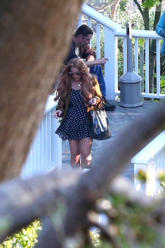Lindsay Lohan quitte le centre Cliffside Malibu Rehab Center de Malibu (Los Angeles) après une énième cure de désintoxication, le 30 juillet 2013.
