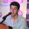 Les Jonas Brothers en concert dans les studios de la Radio Hot 99.5 à Rockville, le 29 juillet 2013.