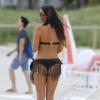 Claudia Romani se détend sur une plage de Miami. Le 4 aout 2013.