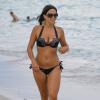 Claudia Romani se détend sur une plage de Miami. Le 4 aout 2013.