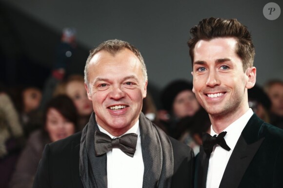 Graham Norton et son compagnon Trevor Patterson lors des National Television Awards à l'O2 Arena de Londres le 23 janvier 2013