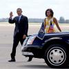 Barack Obama et son épouse Michelle Obama arrivent sur la base aérienne d'Orlando International Airport, le 10 août 2013. 