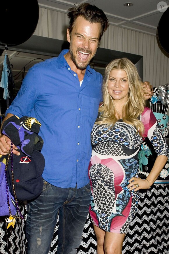 Fergie et Josh Duhamel lors de leur baby shower à Los Angeles, le 28 juillet 2013.